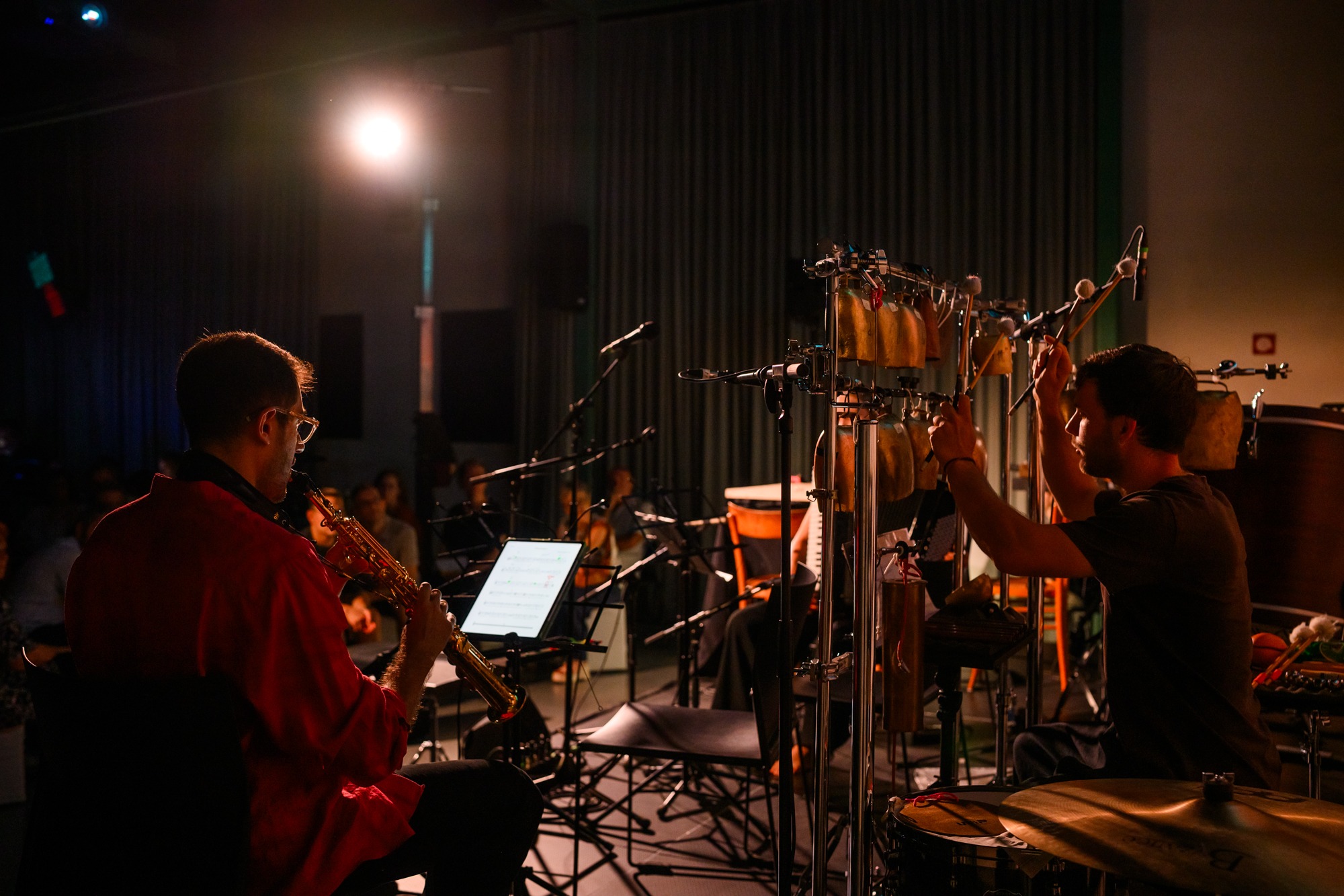 Saxophone and percussion players performing with Index Ensemble.